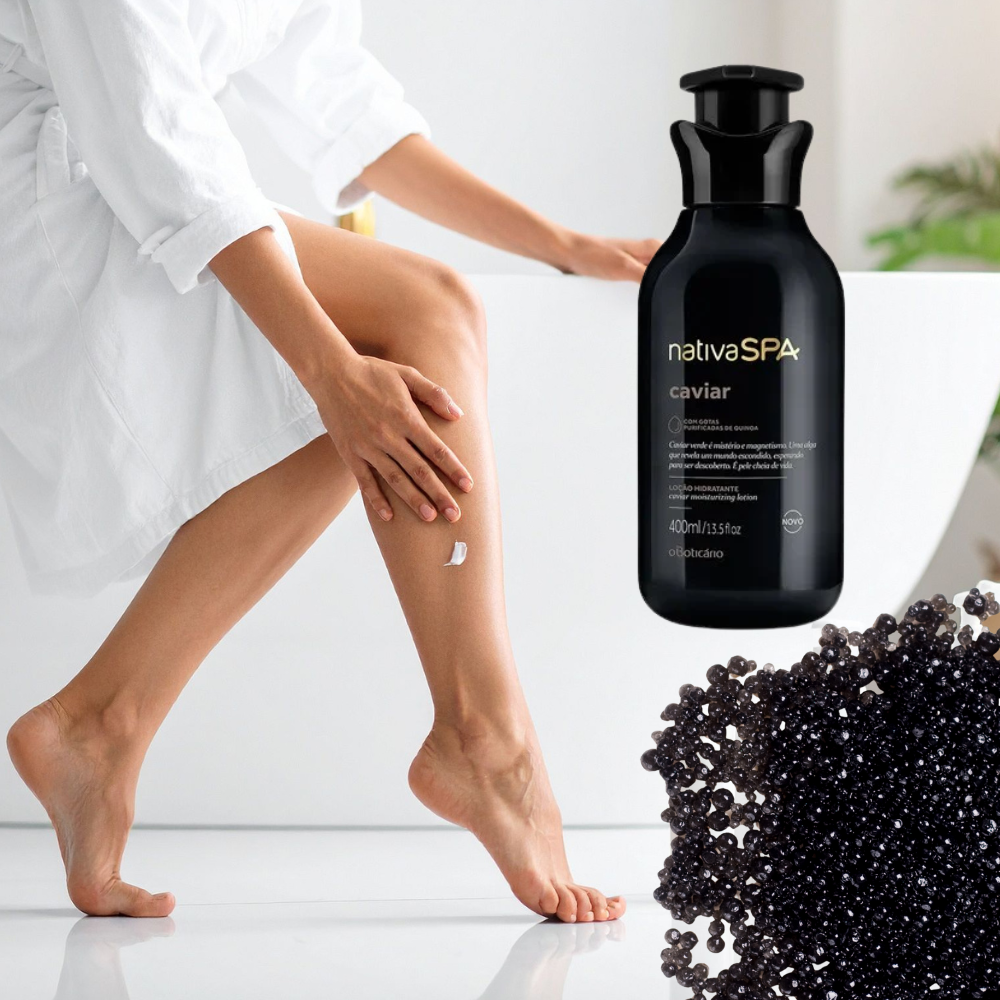 Person sitting with a bottle of nativaSPA caviar product and black caviar on a white background