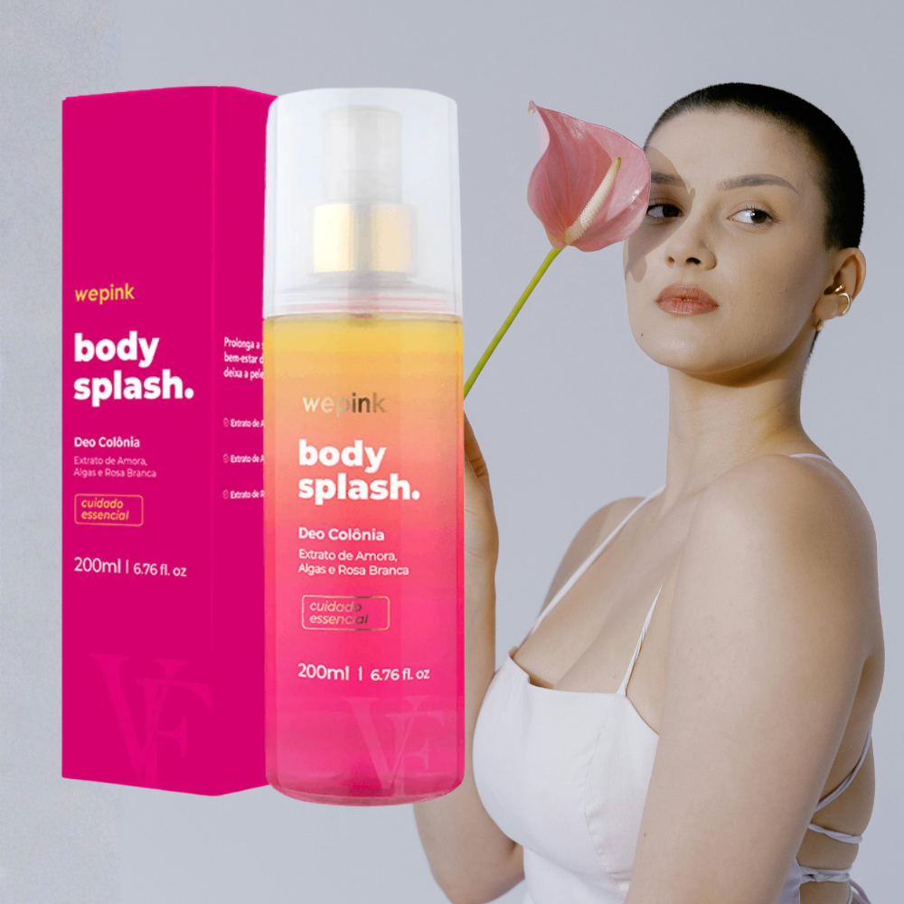 A woman holds a flower and a 200ml bottle of Wepink Body Splash VF Desodorante Colônia, smiling gently.