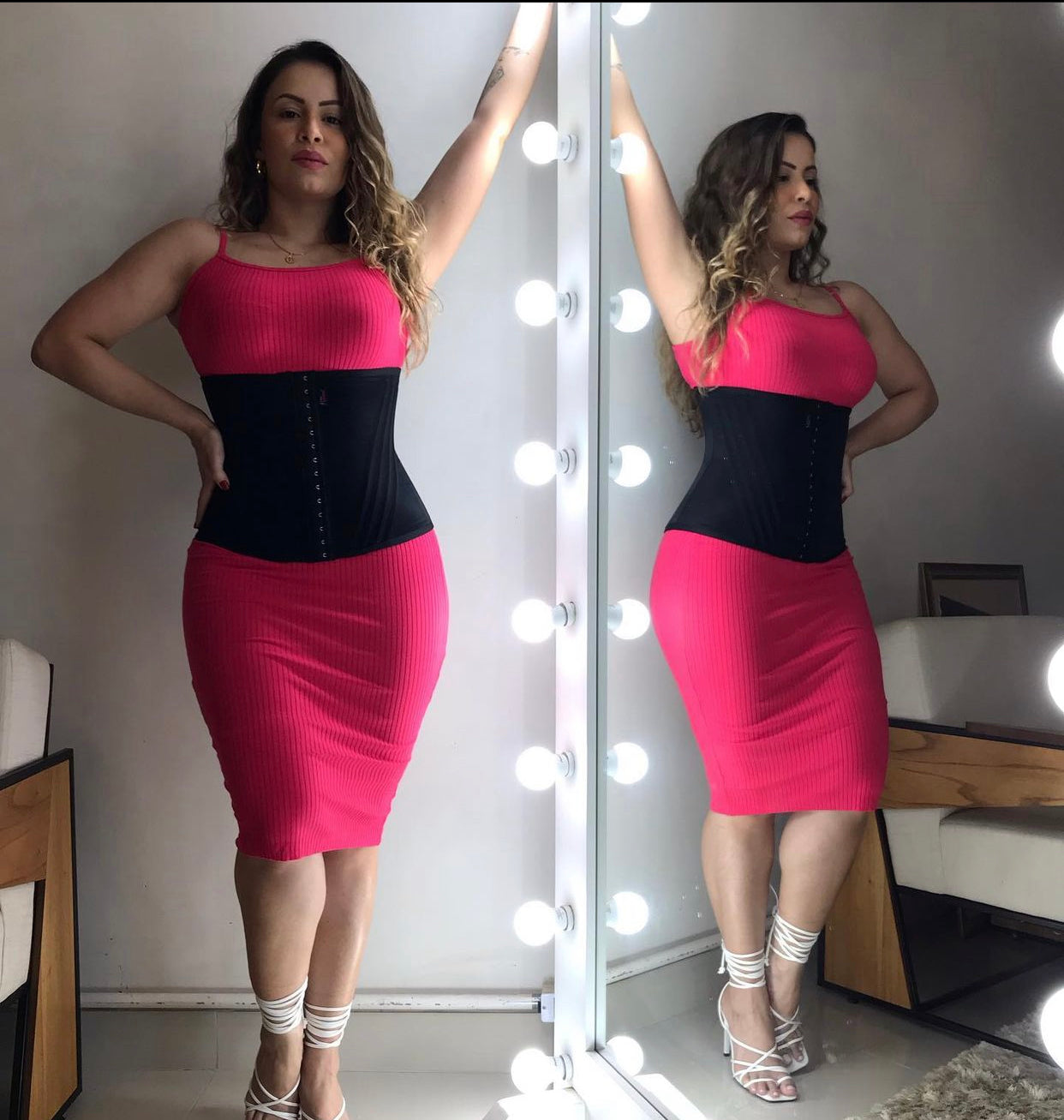 Woman wearing a Black shaping belt over a pink bodycon dress.