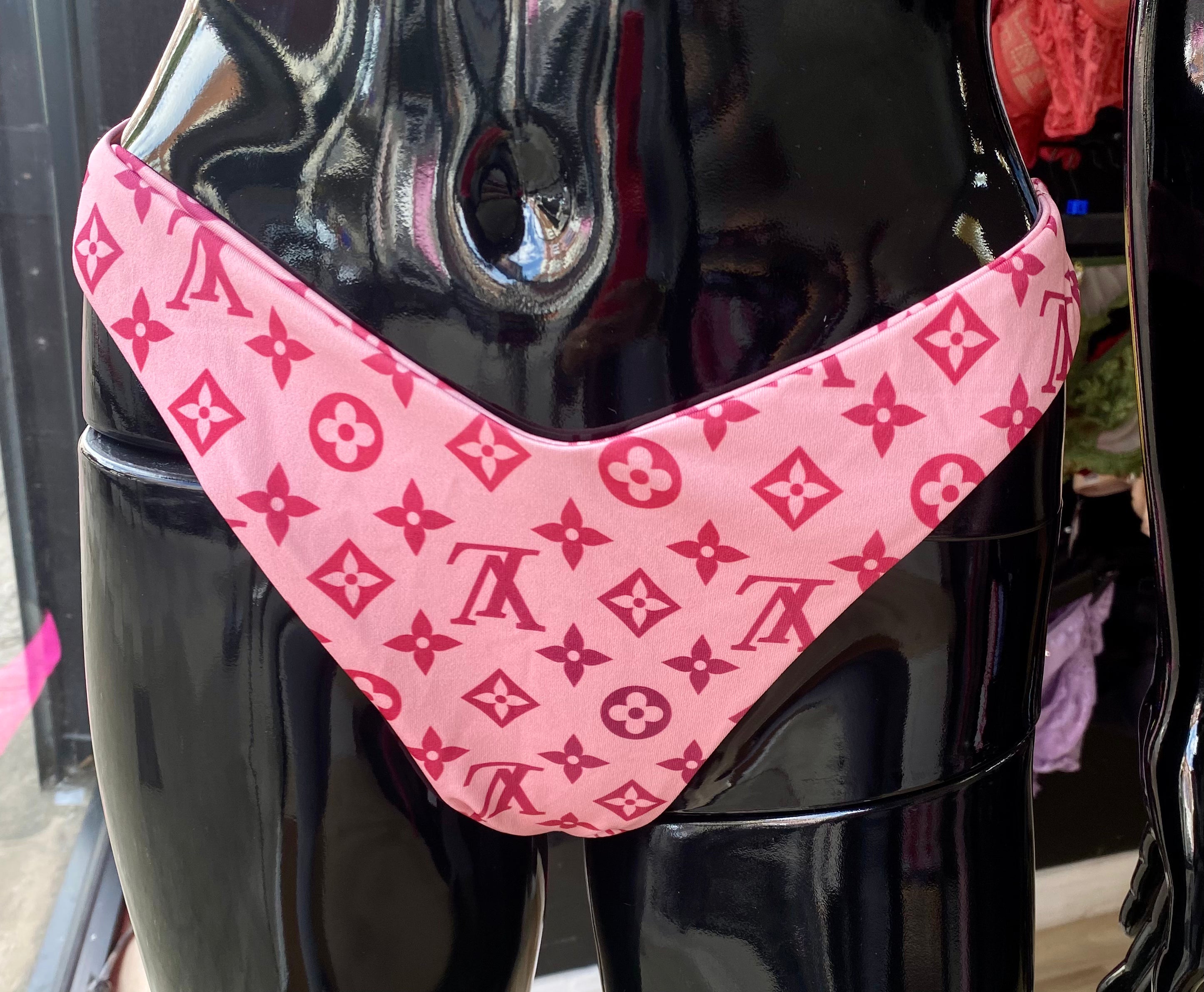 Pink Louis Vuitton bikini bottom.