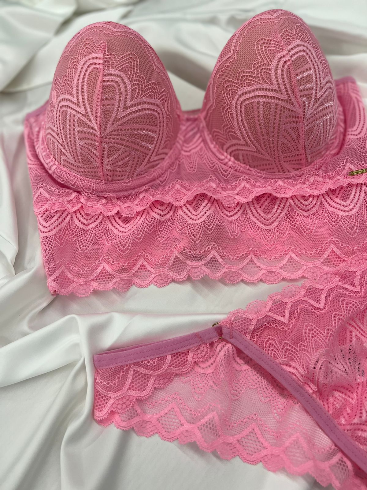 Pink lace bralette, matching underwear set and this style of longline, unlined lace set.